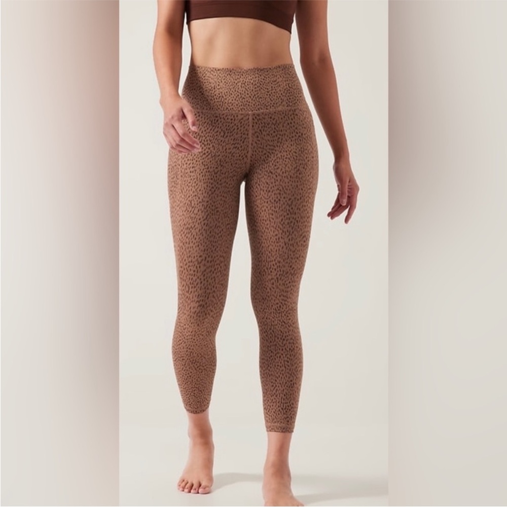 Athleta Salutation 7/8 tights size L EGUC